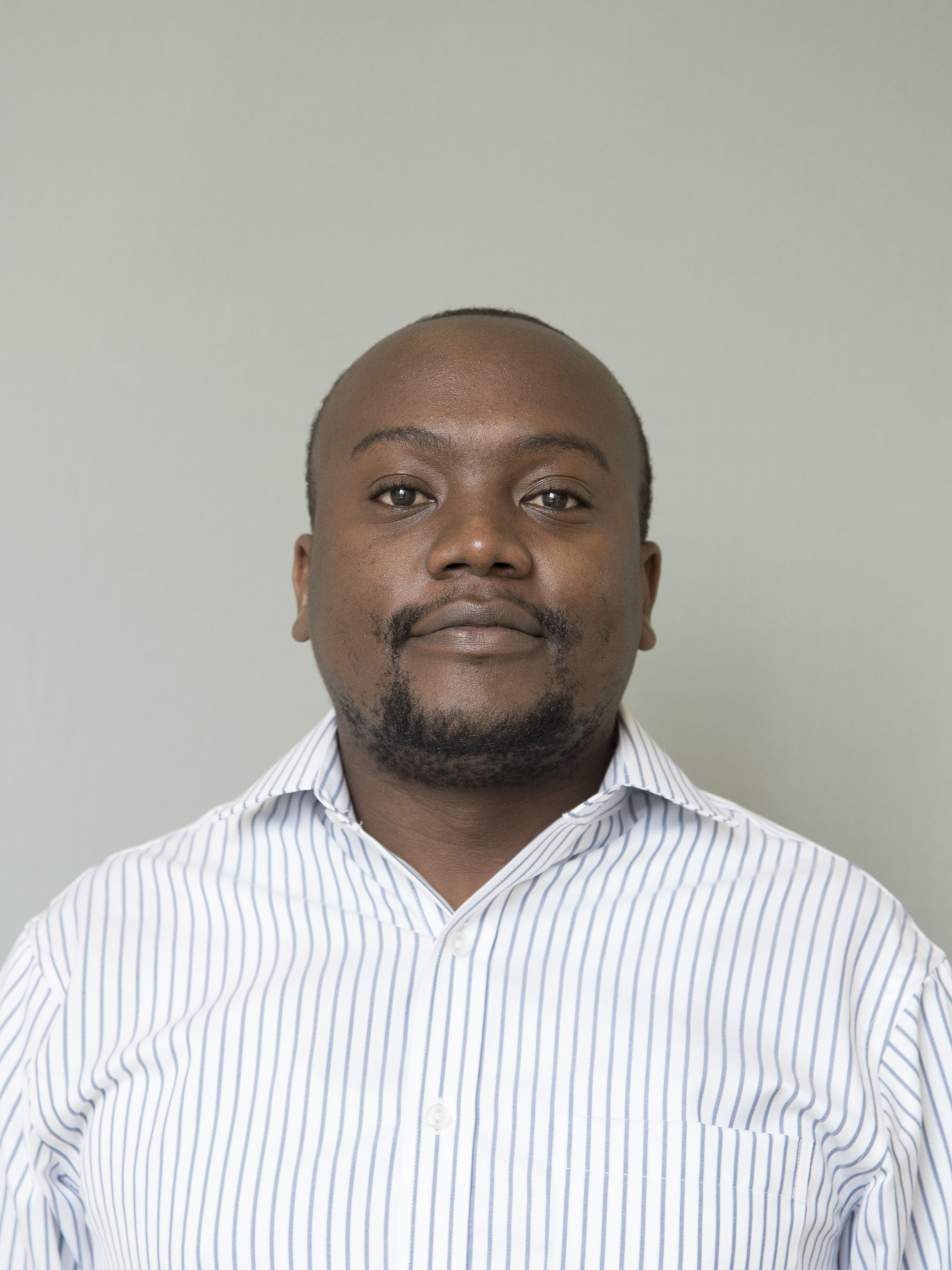 Portrait of Emmanuel Kiiza Mwesiga, MBChB, MMed, PhD